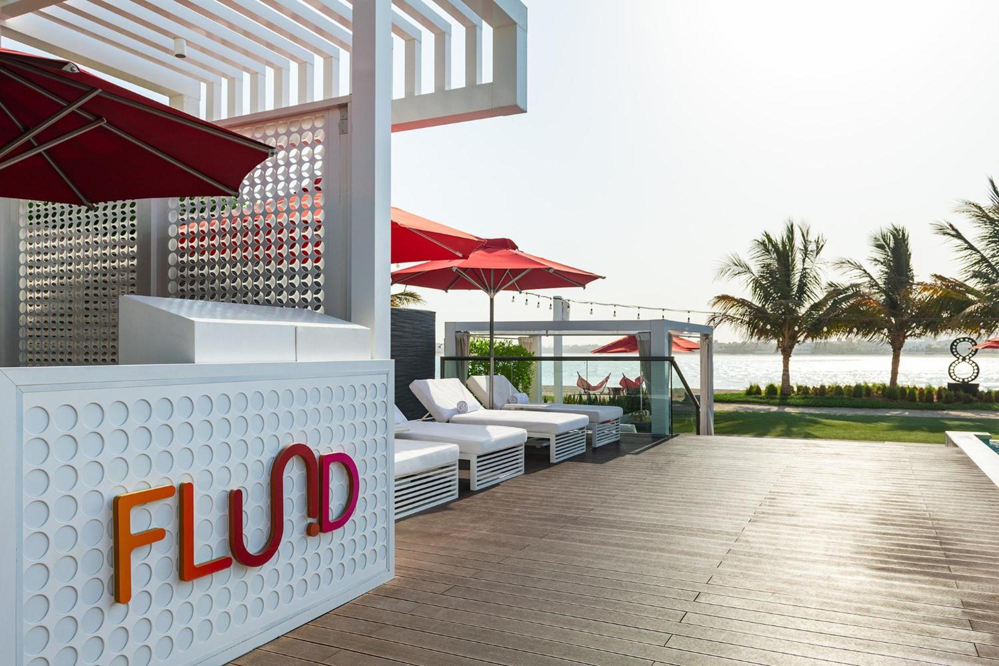 Th8 Palm Dubai Beach Resort, Vignette Collection By Ihg Exterior photo The pool at the hotel